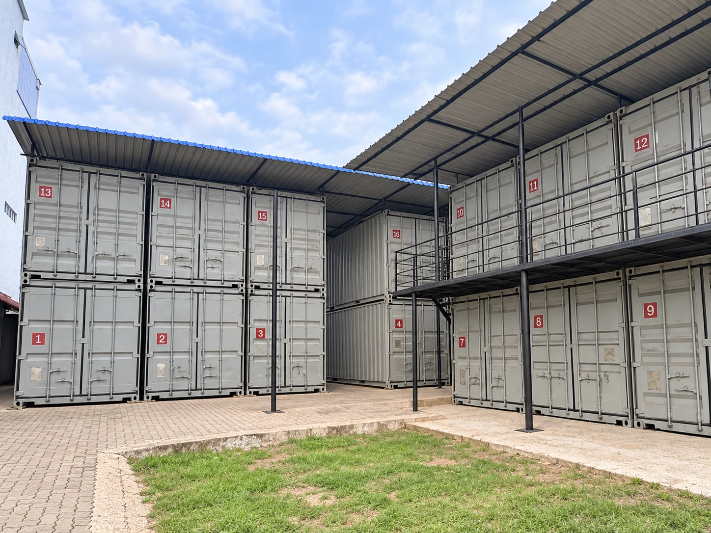 Numbered storage containers across two levels at StoreIt’s container yard